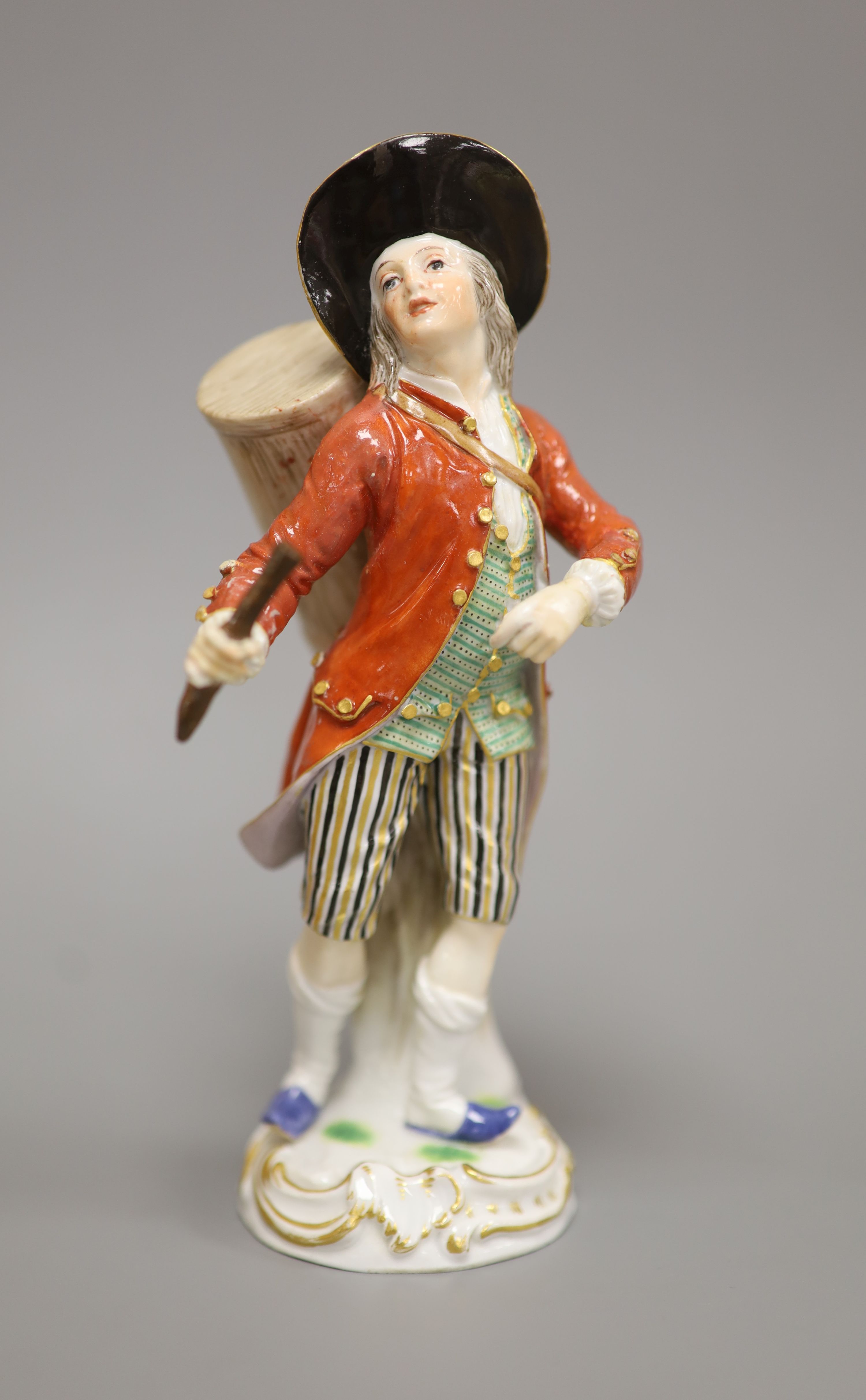 A late Meissen porcelain figure of a drummer boy, polychrome-decorated on scrolled base, height 15cm